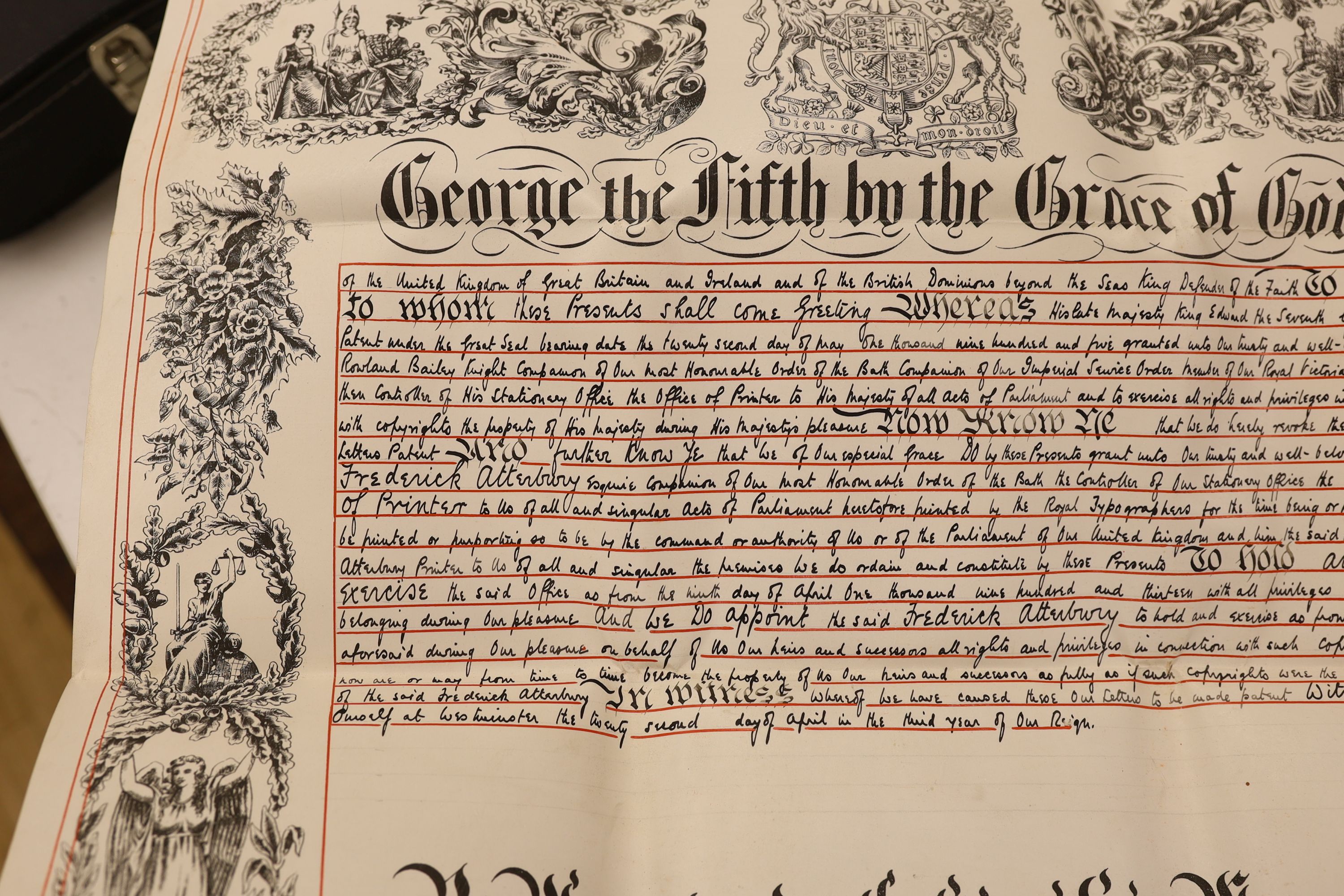 A cased George V Letters Patent related royal parchment document with large wax seal attached, seal separately encased within a tinned cylindrical case, seal 16cm diameter